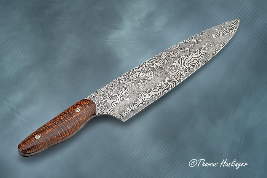 10.5" bladed Carbon Damascus Chef with Curly Koa Handle right view