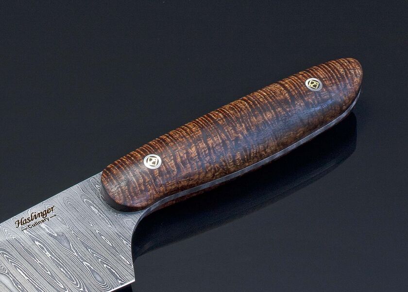 Evolution Chef in Damascus with Curly Koa Handle close up