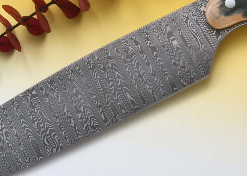 New Generation Damascus Chef Knife handled in Green Tones Mammoth Ivory close up
